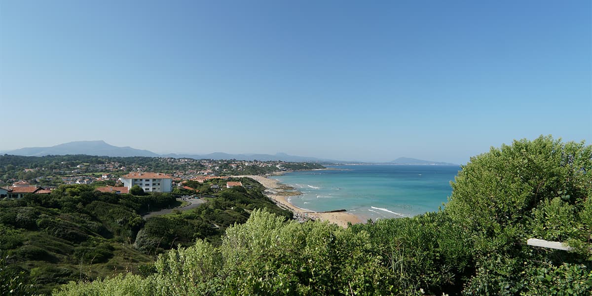 Hills rolling into a beach, France