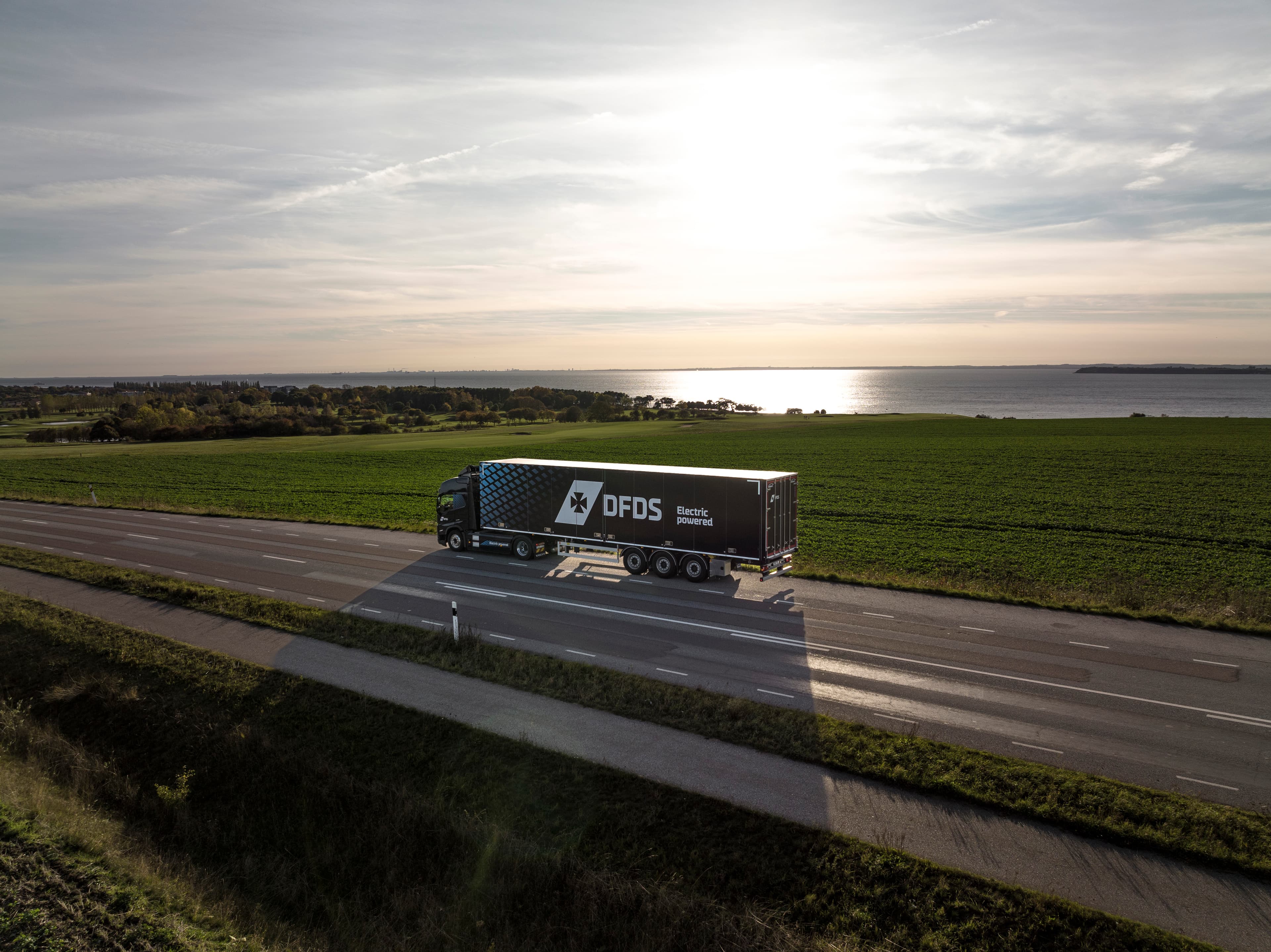 DFDS electric truck driving on the road.