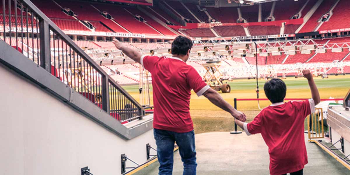 Man and boy at Old Trafford - Manchester United