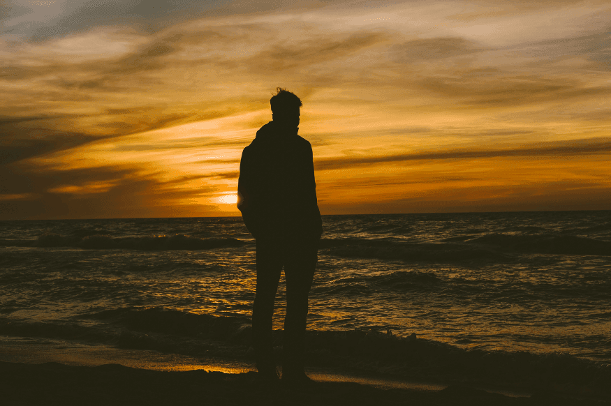 A person is watching sunset over the Baltic Sea