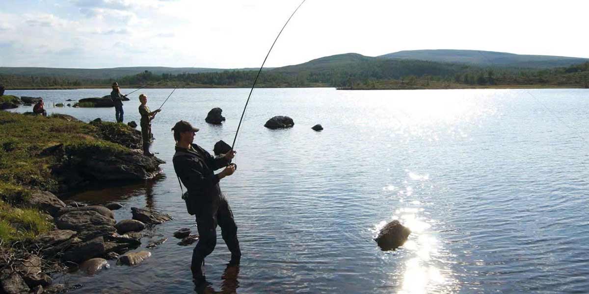 Three men fishing in Norway