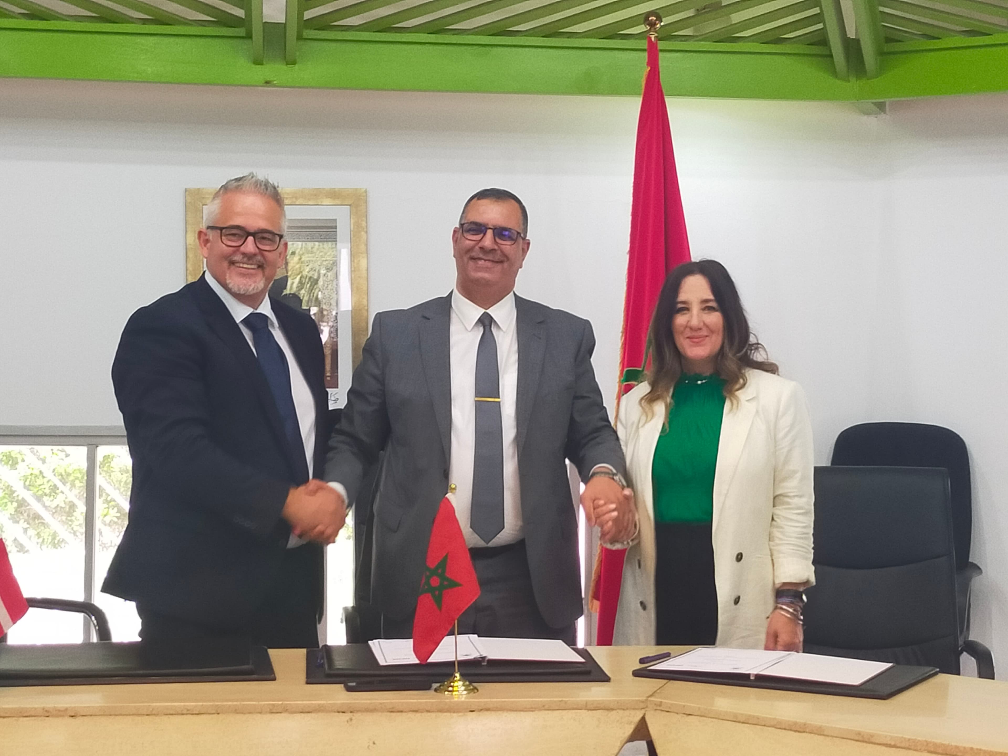 Featured news article picture - DFDS female cadet programme expands to Morocco;
Standing from left to right, all three shaking & holding hands:
Ronny Moriana Glindemann, Managing Director of BU Strait of Gibraltar at DFDS
Dr. Mohamed Briouig, Director of the Higher Institute of Maritime Studies (ISEM)
Gemma Griffin, Vice President and Head of Crewing at DFDS