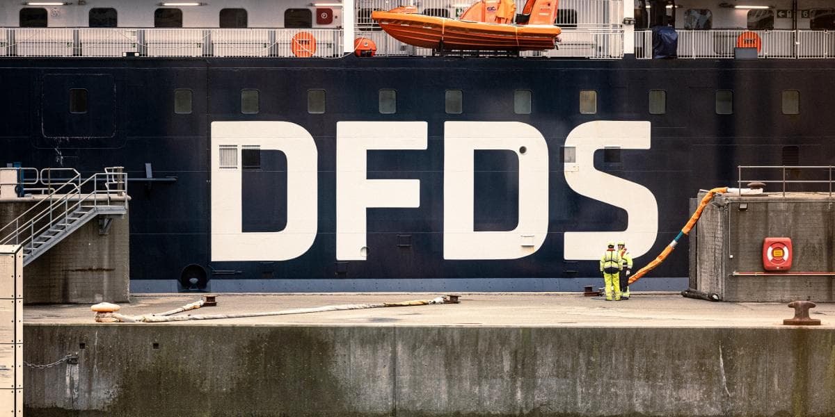 A DFDS ship docked at the port.