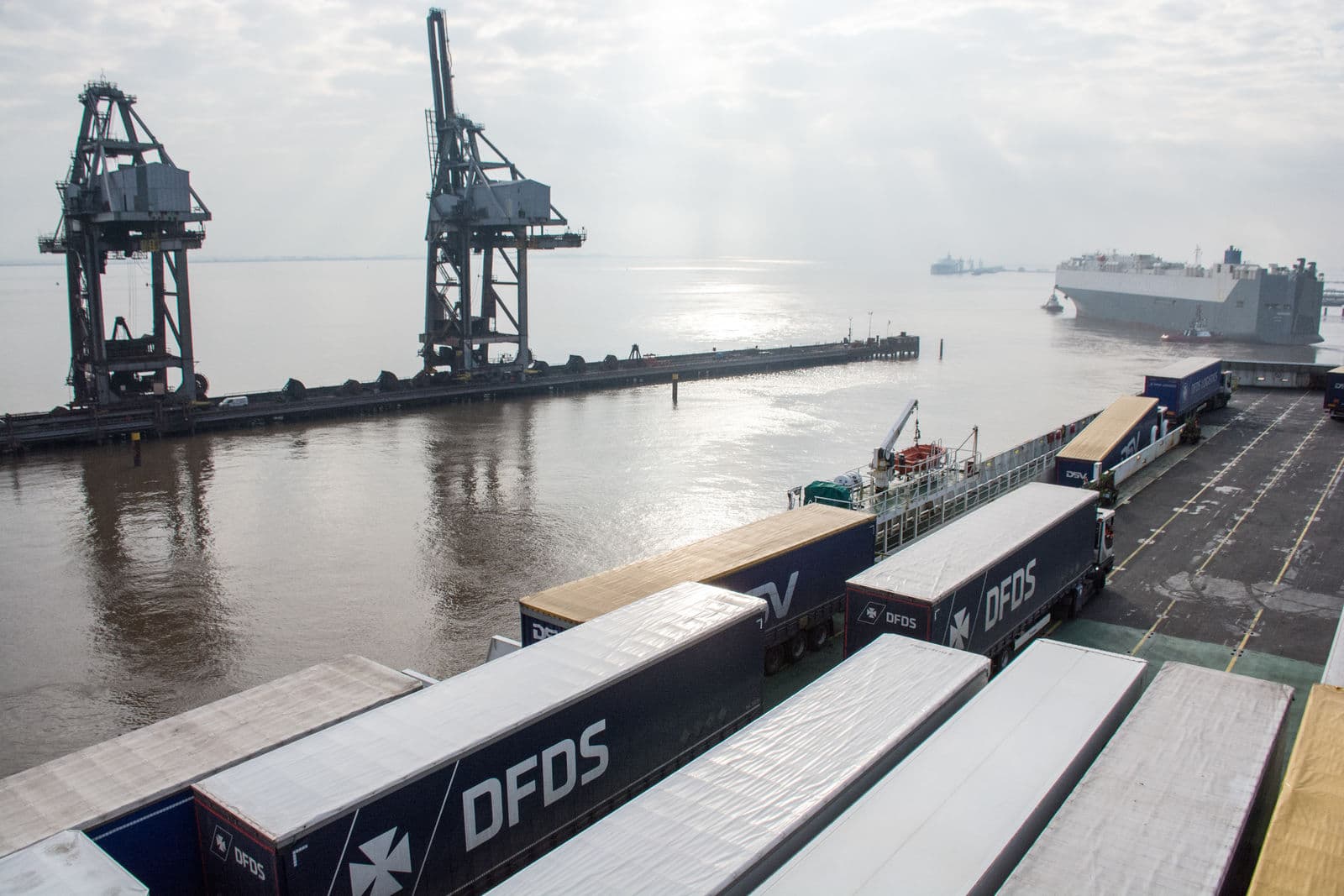 Trucks and trailers parked at the DFDS Freight terminal in Immingham, UK