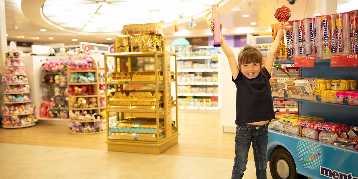 Child in shop onboard Dover-Calais