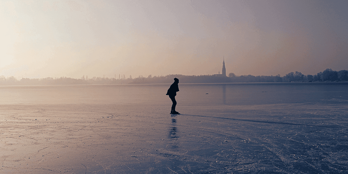 Person skating on a natural ice rink