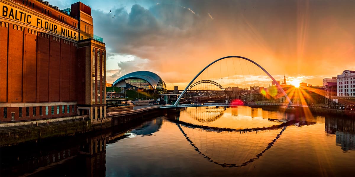 Sunset view of the Gateshead Millennium Bridge in Newcastle