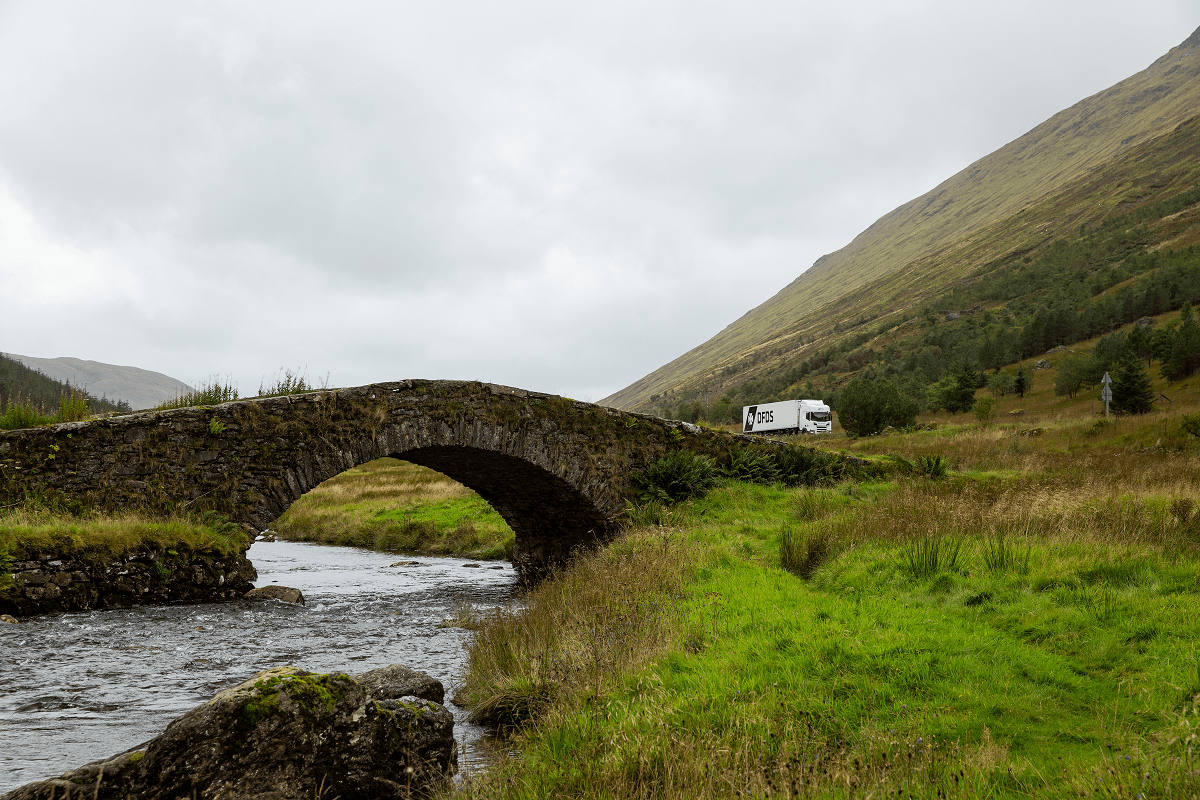 DFDS Logistics truck driving through the Scottish countryside