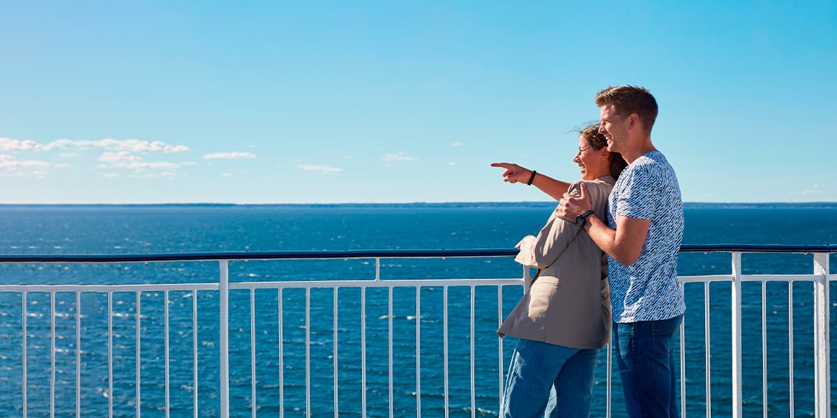 Couple on deck of a DFDS ferry (EXP 11 2027)